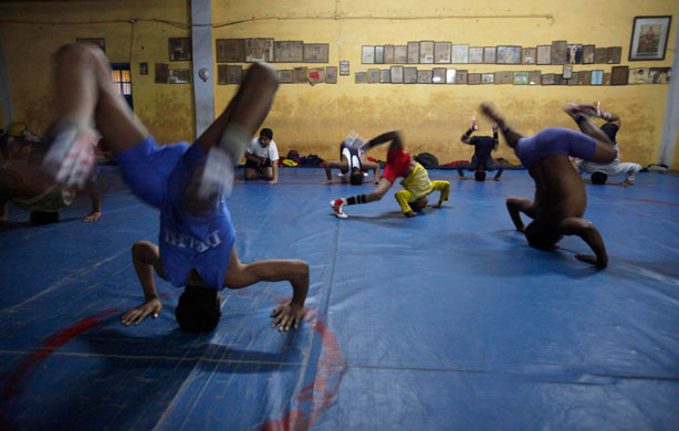 wrestling: Wrestlers train at a gymnasium in New Delhi