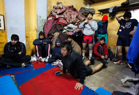 wrestling: Wrestlers train at a gymnasium in New Delhi