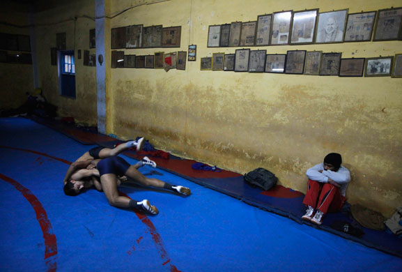 wrestling: Wrestlers train at a gymnasium in New Delhi