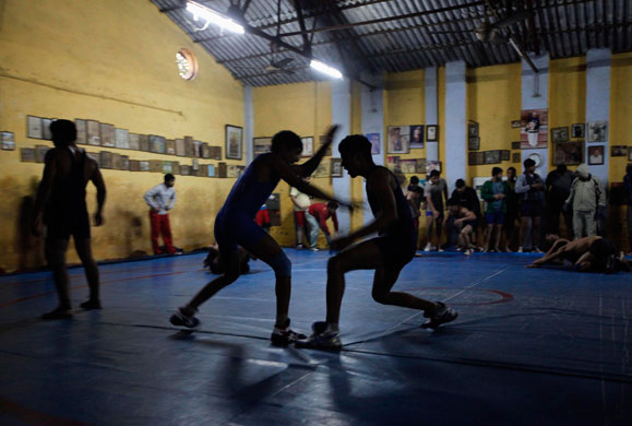 wrestling: Wrestlers train at a gymnasium in New Delhi