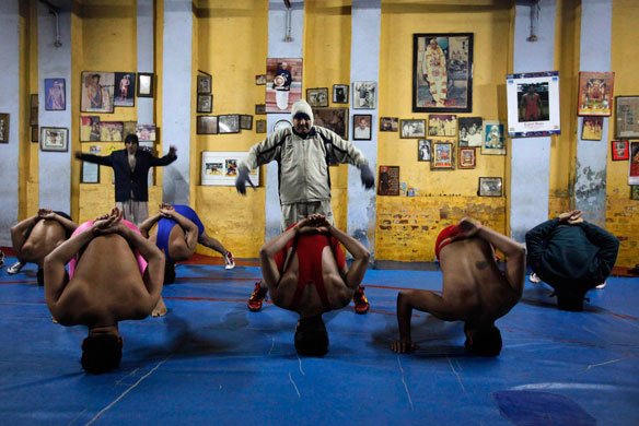 wrestling: Wrestlers train at a gymnasium in New Delhi