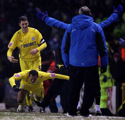 FA Cup 3rd Round: Cardiff's Michael Chopra appears to be tripped Bristol City's Gary Johnson