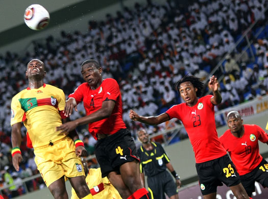 24sport: Benin's Adou Mouftaou attempts to outjump Mozambique's Junior Mate