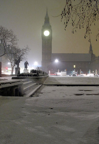 Snow again: A fresh fall of snow blankets London's Parliament Square