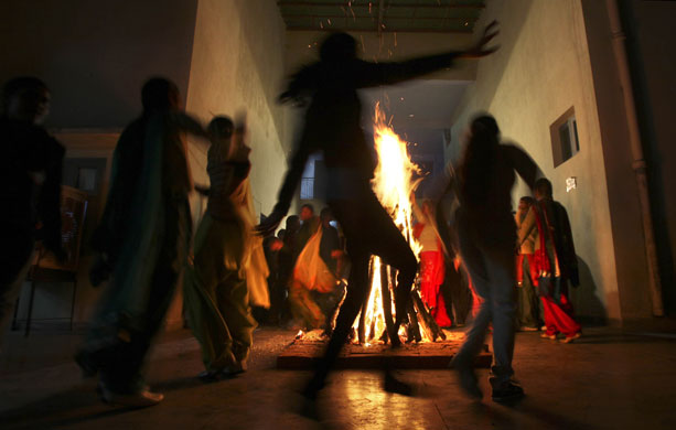 24 hours: Amritsar, India: College girls celebrate the Lohri festival