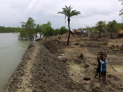 Sinking Sundarbans: The new river bank barely holds the river's high tide in Saheb Ghat Village