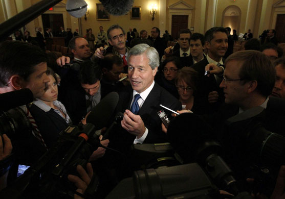 Week in Business: Jamie Dimon, chief executive of JPMorgan Chase, talks to reporters