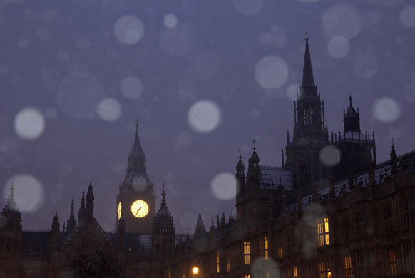 24 hours in pictures: London, UK: Snow falls in front of Big Ben