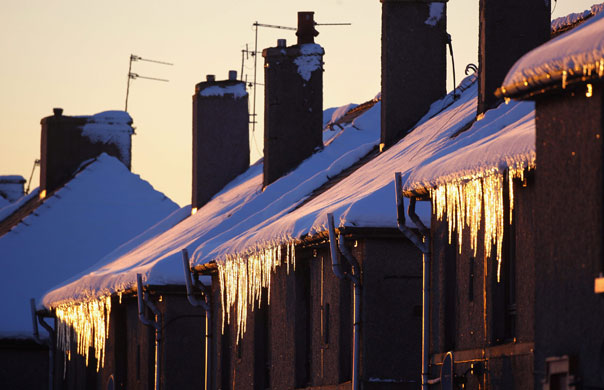 Week in Business: Icicles hang from the roofs of houses in Fauldhouse in Scotland.