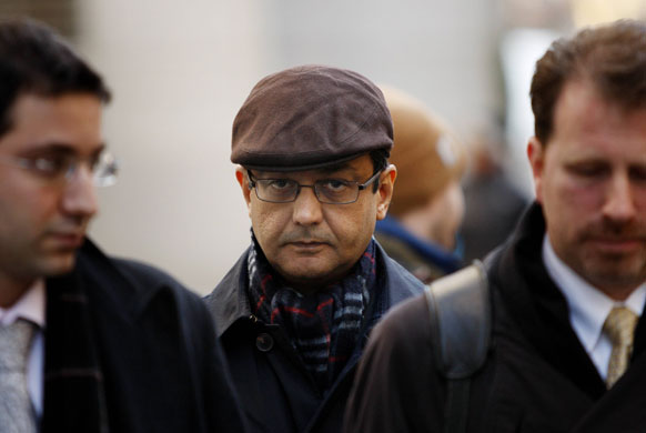 Week in Business: Anil Kumar, centre, a former McKinsey & Co director 