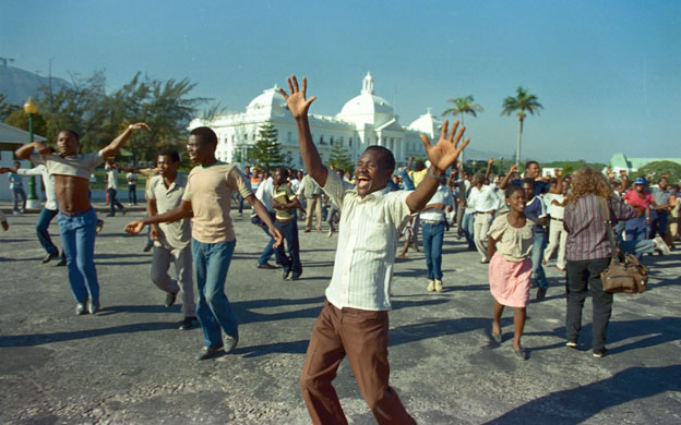 History of Haiti: Haitians citizens celebrate the flight into exile of  Jean-Claude Duvalier