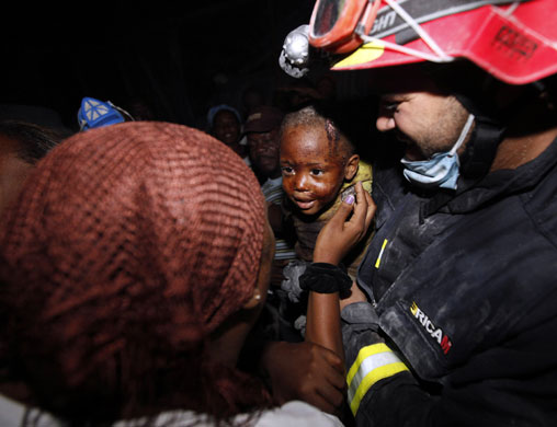 haiti quake: young boy rescued in n Port-au-Prince, Haiti