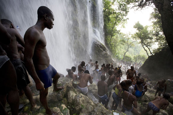 History of Haiti: 2008: Pilgrims bathe and pray in the waterfall at Saut D'eau, Haiti