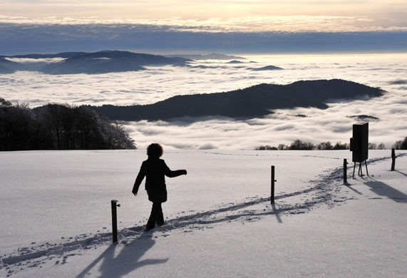 24 hours in pictures: Sea of fog carpets Upper Rhine Plain, Germany