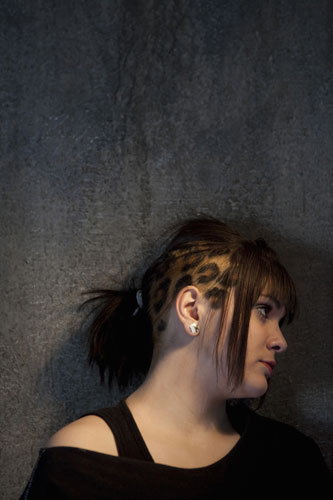 Teenage Hair: A young girl with a pattern shaved into her head