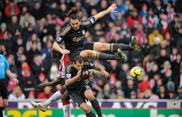 Stoke v Liverpool: Sidibe is outnumbered by Kyrgiakos and Mascherano 