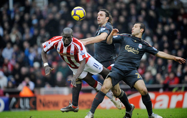 Stoke v Liverpool: Mamady Sidibe is fouled by Kyrgiakos and Mascherano