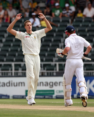 South Africa v England: South African bowler Morne Morkel, left, reacts as Collingwood runs
