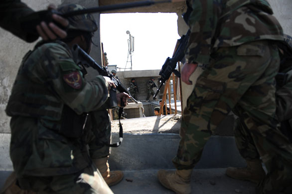 Kabul violence: Afghan commandos take position at a government building 
