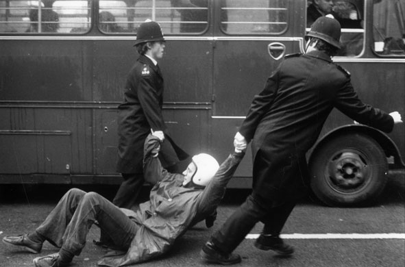 Jayaben Desai: A male striker is dragged away by two policemen