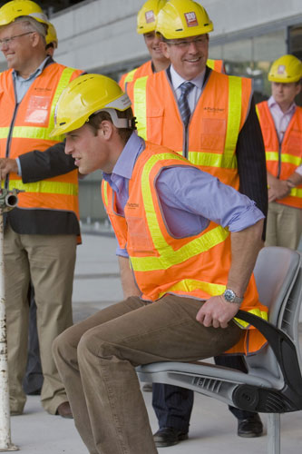 Prince William down under: Prince William tests one of the first seats to be installed at Eden Park