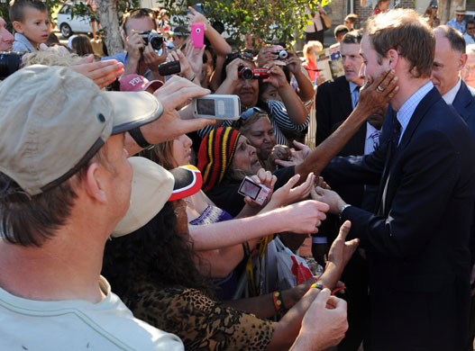 Prince William down under: Prince William meets with members of the local Redfern aboriginal community