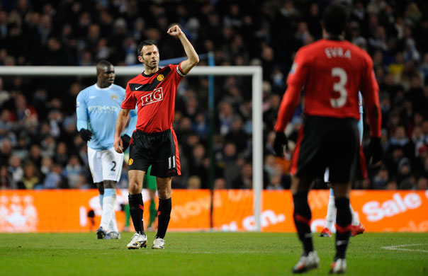 City v United: Ryan Giggs celebrates opening the scoring