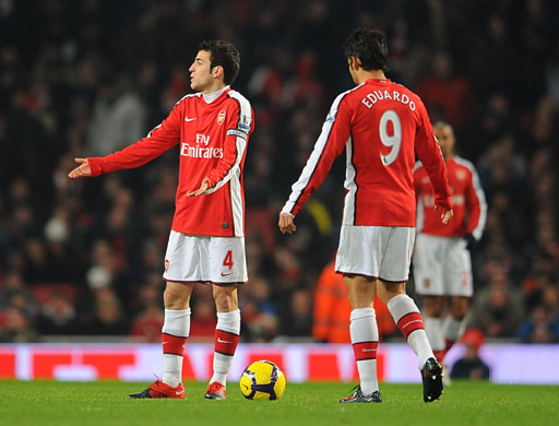 Wednesday Footie: Arsenal's Fabregas & Eduardo are dejected after Bolton's Gary Cahill scores