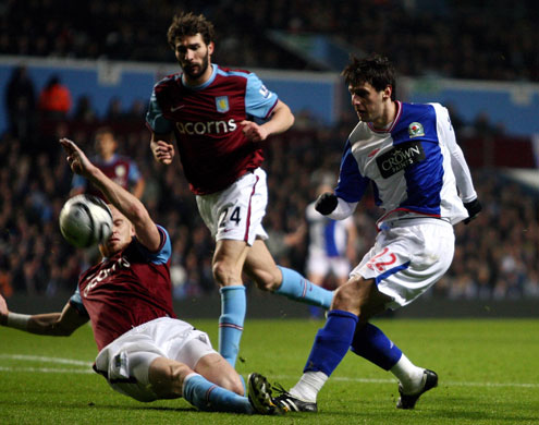 Wednesday Footie: Nikola Kalinic's shot blocked by Aston Villa's James Collins