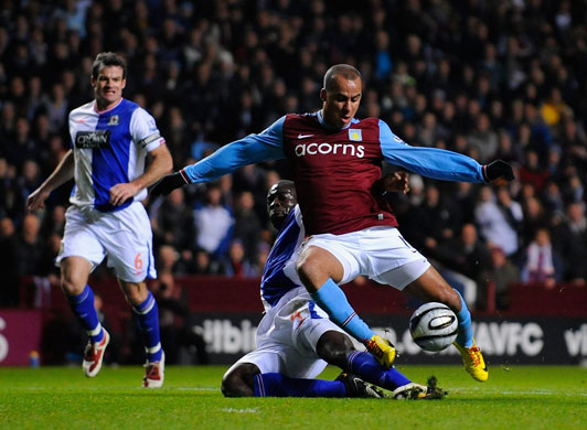 Wednesday Footie: Samba gives away a penalty with a clumsy challenge on Agbonlahor