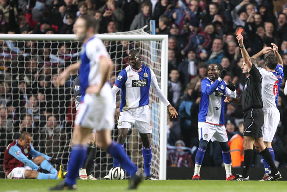 Wednesday Footie: Blackburn Rovers' Samba is sent off for a foul on Aston Villa's Agbonlahor