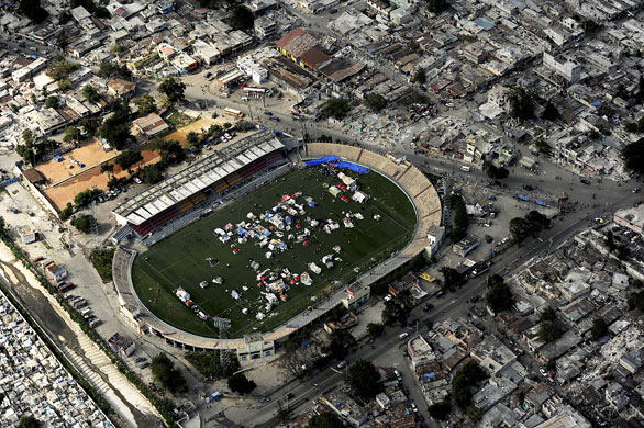Aerial views of Haiti: A tent city set up in a sports stadium in Port-au-Prince
