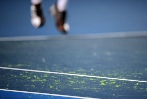 tennis: Fur from the tennis balls sits on the court