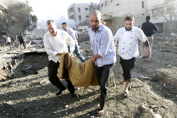 bombs in  baghadad: Suicide car bomb attack outside the Alhamraa hotel in Baghdad