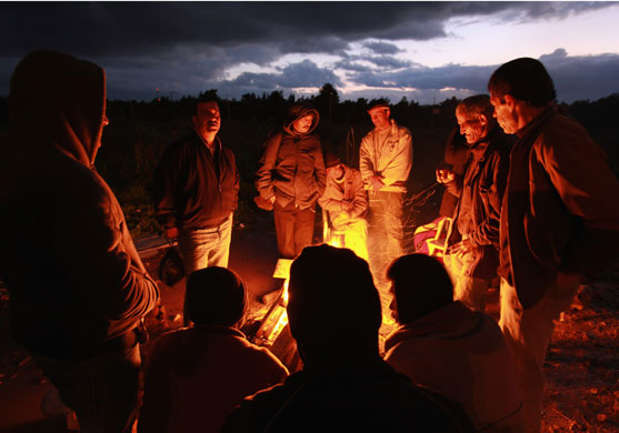 24 hours in pictures: West Bank labourers at Eyal Crossing, Israel