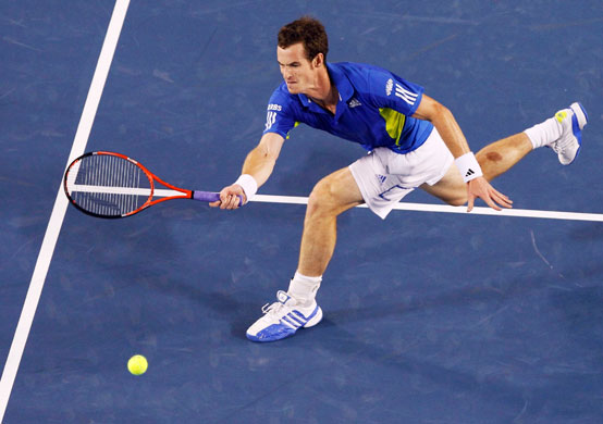Murray v Nadal Qtr Final: Andy Murray of Britain hits a return against Spain's Rafael Nadal 