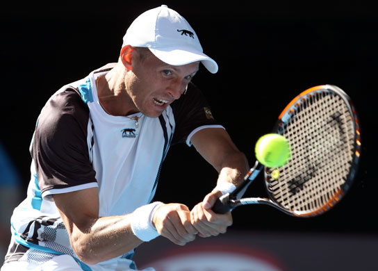 Aus Open Day 10: Davydenko plays a backhand return