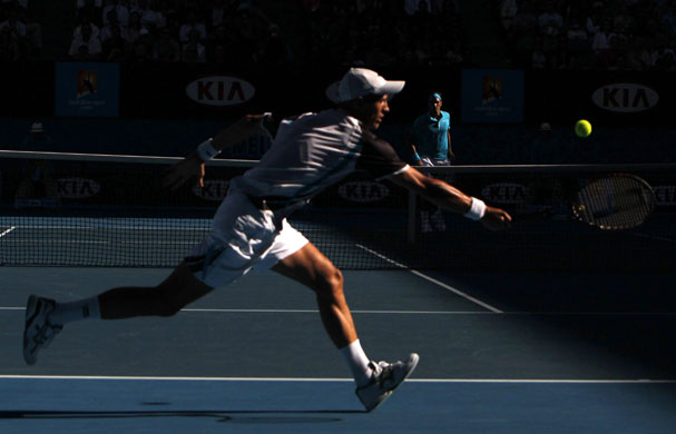 Aus Open Day 10: Nikolay Davydenko returns to Roger Federer