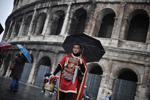 24 hours : Rome, Italy: A performer dressed as a centurion
