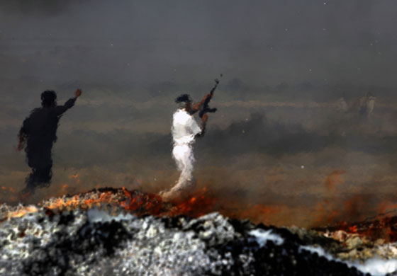 24 hours : A customs official shoots into the air in Karachi