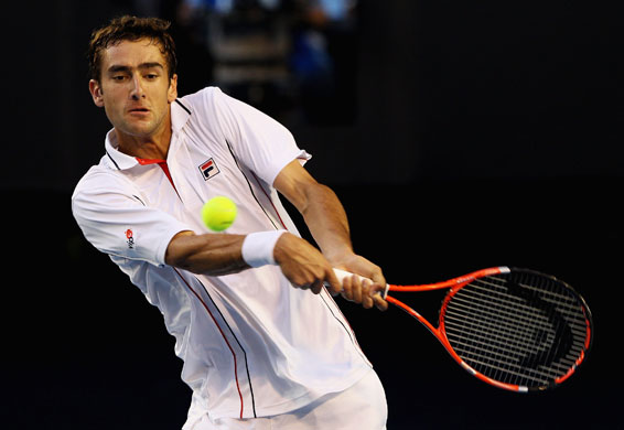 Aus Open Day 11: Marin Cilic plays a backhand return to Andy Murray