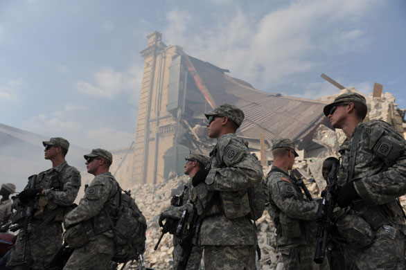 Haiti's survivors: 23 January: US Paratroopers patrol in Port-au-Prince 
