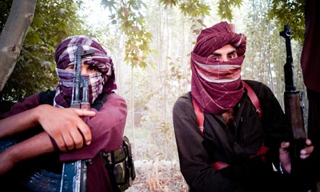 Taliban fighters in a Madrassa compound near the northern city of Kundoz in Afghanistan.