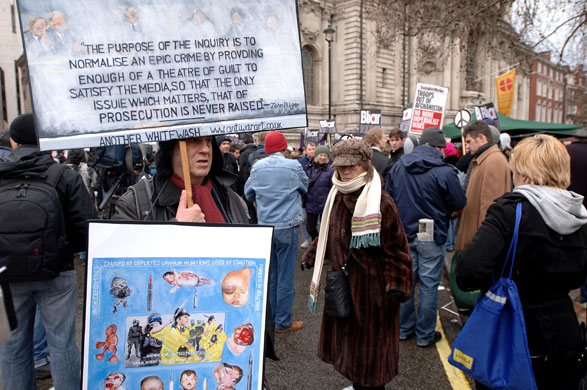 Anti-Blair protests: Demonstrators outside the Queen Elizabeth II conference centre