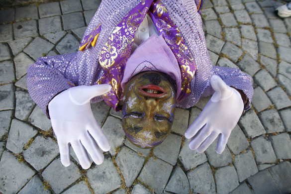 24 hours: Cape Town, South Africa: A Cape Minstrel band rests at a carnival
