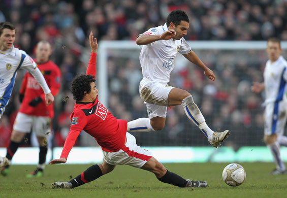 FA cup 3rd round: Jason Crowe of Leeds United hurdles the challenge of Fabio Da Silva
