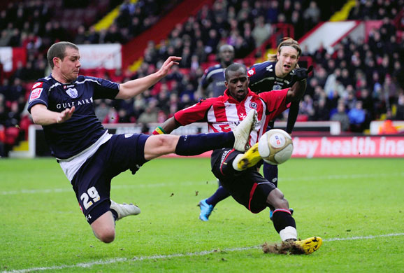 FA cup 3rd round: Henri Camara of Sheffield United is tackled by Gary Borrowdale of QPR