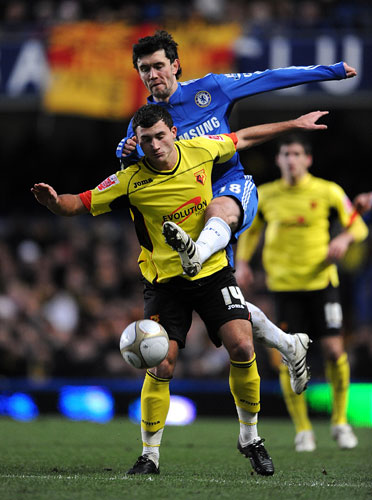 FA cup 3rd round: Watford's Ross Jenkins and Chelsea's Yuri Zhirkov battle for the ball