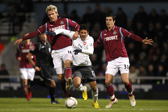 FA cup 3rd round: West Ham United's Radoslav Kovac and Arsenal's Carlos Vela at Upton Park