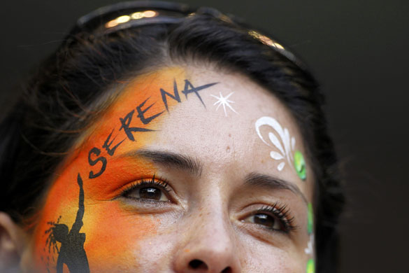 Aussie Open Women's Final: A Serena fan watches her women's singles final match against Henin